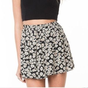 Brandy Melville daisy print black skirt